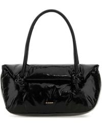 Jil Sander Peach Leather Small Knot Handle Handbag in Pink