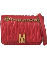 Moschino - Logo Plaque Quilted Shoulder Bag - Lyst