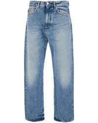 Versace - Jeans With Back Logo Patch And Faded Effect - Lyst