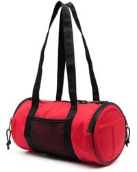 Eastpak - X Telfar Medium Duffle Logo Patch Shoulder Bag - Lyst