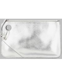 JW Anderson - Leather Pouch Clutch Bags - Lyst