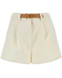 Prada - Belted Pleated Shorts - Lyst