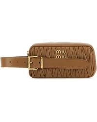 Miu Miu - Logo-lettering Zipped Clutch Bag - Lyst