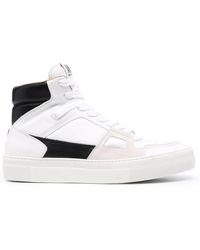 AMI Leather Sneakers in Black for Men - Lyst