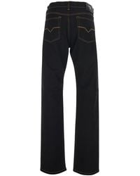 Versace - Jeans With Five-Pocket Design And Logo Patch On The Back - Lyst