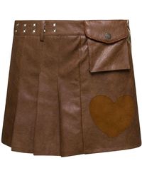 ANDERSSON BELL - Arina Pleated Mini Skirt With Heart And Patch Pocket Detail - Lyst