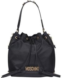 Moschino - Logo Plaque Tassel Detailed Bucket Bag - Lyst