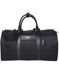 Moschino - And Logo Travel Bag - Lyst