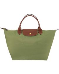 Longchamp - Le Pliage Medium Top Handle Bag - Lyst