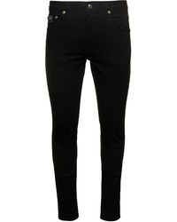 Versace - Skinny Jeans With Logo - Lyst