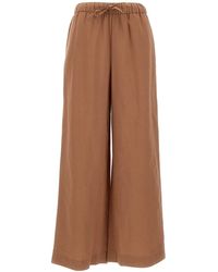 white linen pants and top