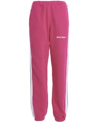 gym and workout clothes - Save 3% Palm Angels Cotton Bold Loose Joggers in Fuchsia gym and workout clothes Palm Angels Activewear Womens Activewear Red 