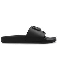 Moschino - Logo Embossed Slip-On Sandals - Lyst