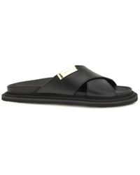 Moschino - Black Calf Leather Bos Taurus Flat Sandals - Lyst