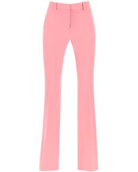 Versace - Low Waisted Flared Trousers - Lyst