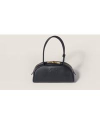 Miu Miu - Miu Miu Embossed Logo Top Handle Bag - Lyst