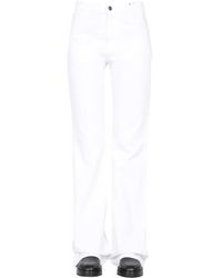 Raf Simons - Flared Jeans - Lyst