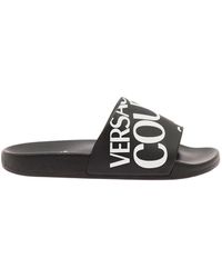 Save 9% Versace Logo Slippers in Black Womens Shoes Flats and flat shoes Slippers 