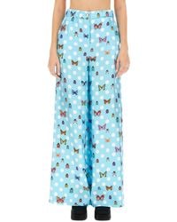 Versace - Pants With Butterfly Print - Lyst