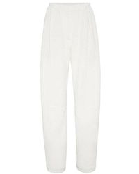 Brunello Cucinelli - Off Linen Tapered Trousers - Lyst