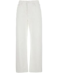TOTEME - High Waisted Jeans With Twisted Seam And Logo Patch On The Rear - Lyst