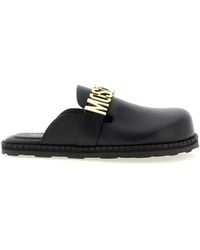 Moschino - Leather Sabots - Lyst