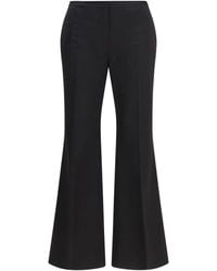 TOTEME - Pants Kick Flare Raw-Edge Cotton Trousers - Lyst
