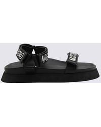 Moschino - Black Rubber Logo Sandals - Lyst