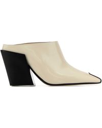 Bottega Veneta - Ivory Leather Ventura Mules - Lyst