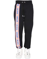 Gcds - Jogging Pants With "Cute Tape" Logo Band - Lyst