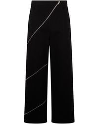 Alaïa - Wide-Leg Trousers With Zip Detail — Cotton - Lyst