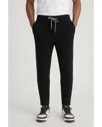 Brunello Cucinelli - Wool Knit Trousers - Lyst
