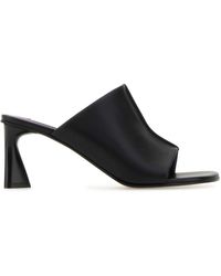 Stella McCartney Alter Mat Sneak-Eye Mules in Black | Lyst