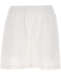 white linen pants and top