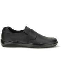 Prada - Calf Leather Bos Taurus Slip-On Loafers - Lyst