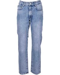 Mujer Ropa de Vaqueros de Vaqueros de pernera recta Straight jeans Love Moschino de Denim de color Gris 