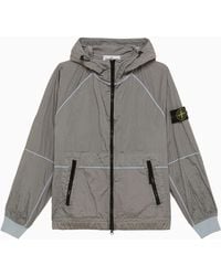 Stone Island - Packable Light Blue Jacket With Logo - Lyst