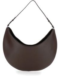 Jacquemus - 'Le Calisso Rond Large' Shoulder Bag With Adjustable Strap And Embossed Logo - Lyst