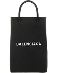 Balenciaga - Balenciaga Logo-Embroidered Calf Top Handle Bag - Lyst