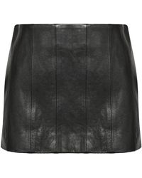 KHAITE - Meelar Leather Mini Skirt - Lyst