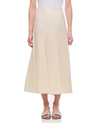 KHAITE - Lenno Flared Hem Midi Skirt - Lyst