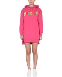 Moschino - Dress With Flocked Logo - Lyst