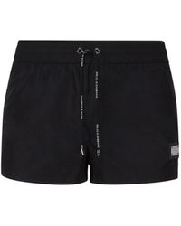 Dolce & Gabbana - Short Beach Boxer Shorts Made Of Lightweight Nylon With Metal Logo Plaque - Lyst