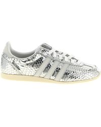 adidas gazelle silver green womens Valentino Garavani Bos Taurus Low Top Sneakers On Sale – Ask Me Wear main image 0