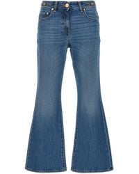 Versace - Flared Denim Jeans With Metallic Jellyfish Detail - Lyst