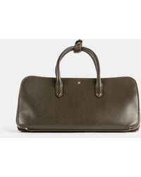 Maison AlaïA - Sac Delta Small Mini Bags - Lyst