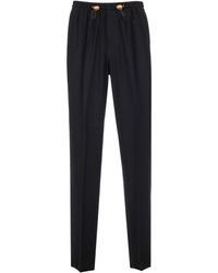 Versace - Trousers With Medusa Details - Lyst