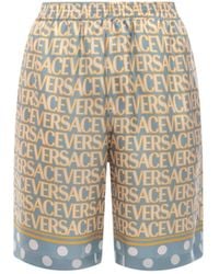 Versace - Stylish Silk Bermuda Shorts With All-Over Logo - Lyst