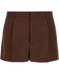 Gucci - Logo-Embossed Tailored Wool-Twill Shorts - Lyst