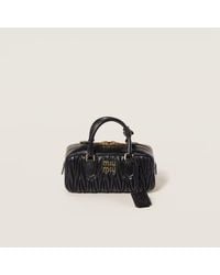 Miu Miu - Miu Miu Matelassé Top Handle Bag - Lyst